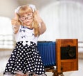 Girl with vintage camera Royalty Free Stock Photo