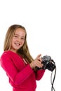 Girl with vintage camera laughing isolated on white