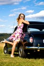 Girl and a vintage car Royalty Free Stock Photo