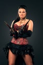 Girl with vintage guns in steampunk style Royalty Free Stock Photo