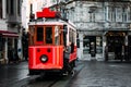 Girl in a vintage tram on the Taksim Istiklal street in Istanbul. Girl on public transport. Old Turkish tram on Istiklal street,