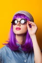 Girl with violet hair in sunglasses Royalty Free Stock Photo