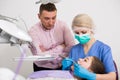 Girl visiting dentistry with father Royalty Free Stock Photo