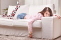 Girl waiting bored on her living room watching you Royalty Free Stock Photo