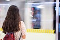 Girl waiting for a train at the subway station Royalty Free Stock Photo