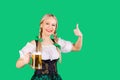 Girl waitress oktoberfest in national costume with a mug of beer Royalty Free Stock Photo