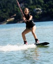 Girl wakeboarding Royalty Free Stock Photo