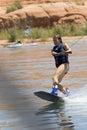 Girl Wakeboarding at Lake Powe Royalty Free Stock Photo