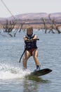 Girl Wakeboarding at Lake Powe Royalty Free Stock Photo