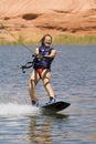 Girl Wakeboarding at Lake Powe Royalty Free Stock Photo