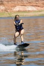 Girl Wakeboarding at Lake Powe Royalty Free Stock Photo