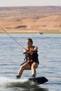 Girl Wakeboarding at Lake Powe Royalty Free Stock Photo
