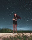 Girl walking alone in starry night