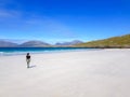 A girl walking on a beach Royalty Free Stock Photo