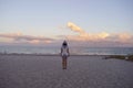 Girl walking at the beach