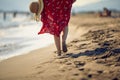 Girl walking on the beach at sunrise and enjoying Royalty Free Stock Photo