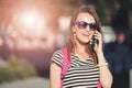 Girl Walking And Calling On Smartphone