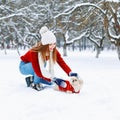 Girl walking a dog