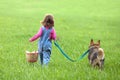 Girl walking with a dog