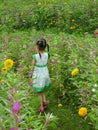 Girl walking in the garden