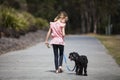 Girl Walking Her Dog Royalty Free Stock Photo