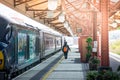 Tourist girl or student with a backpack walking in Metro station Royalty Free Stock Photo
