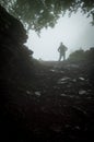 Girl Walking in the Mountains during Rainy Weather Royalty Free Stock Photo