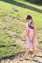 Girl walking in mud Royalty Free Stock Photo