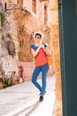 Girl walking in old town Royalty Free Stock Photo