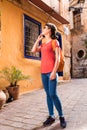 Girl walking in old town Royalty Free Stock Photo