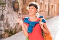 Girl walking in old town Royalty Free Stock Photo