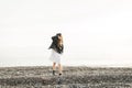 Little girl walking on the sea