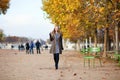 Girl walking in the Tuilleries garden Royalty Free Stock Photo
