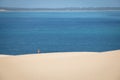 Girl walking on the white dunes on the Bazaruto Island