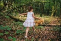 Girl walks in the woods. girl running in the woods Royalty Free Stock Photo