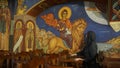 Girl at the wall in a Church in Cyprus