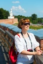 Girl on the walls of the Kremlin in Veliky Novgorod