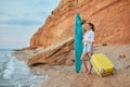 Girl want to catch wave on surfboard. Summer travel, surfing time idea. Relaxation and holiday trip concept. Copy space Royalty Free Stock Photo