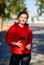 Girl after warm-up with a refreshing drink