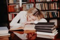 The girl was preparing for the exam reading book sleeping Royalty Free Stock Photo