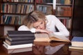 The girl was preparing for the exam reading book sleeping Royalty Free Stock Photo