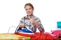 Girl with washed linen around ironing board and iron isolated Royalty Free Stock Photo