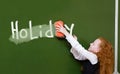 Girl washes with chalkboard word