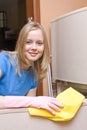 Girl washes refrigerator