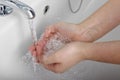 Girl washing hands