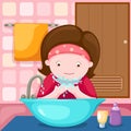 girl washing her face in bathroom