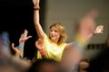 A girl watches a concert at Sonar Festival