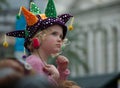 Girl watches parade on Mardi Gras