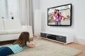 Girl Watching Movie On Television Royalty Free Stock Photo