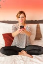 Girl Watching TV in Bed Royalty Free Stock Photo